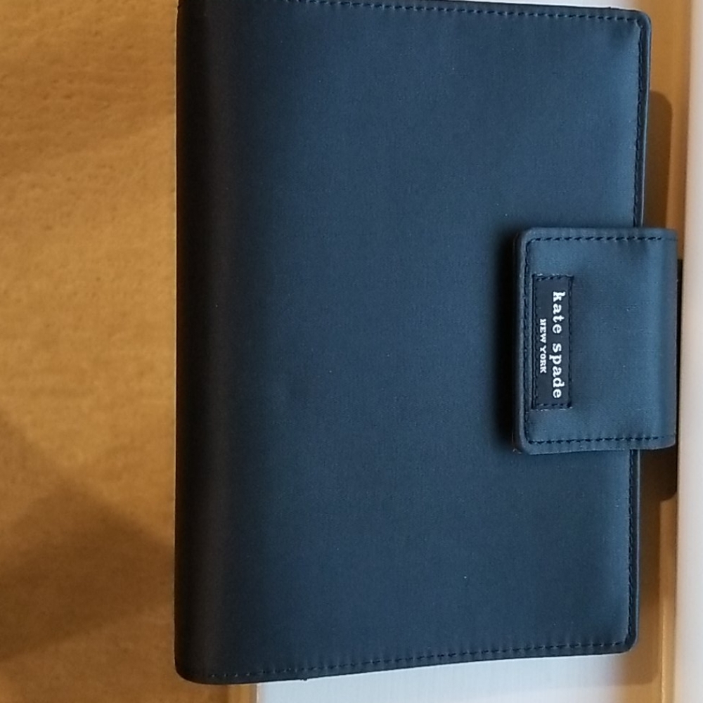 Kate Spade new york organizer wallet.